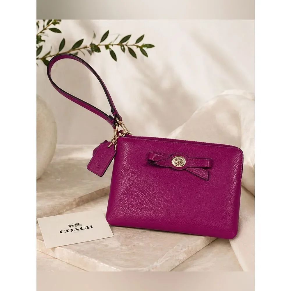 Coach Magenta Leather Wristletโwith Bow Accent